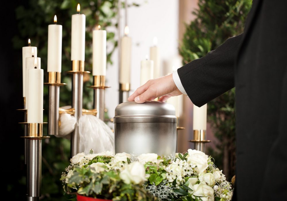 Grief – Funeral and cemetery Religion, death and dolor - funeral and cemetery; urn funeral